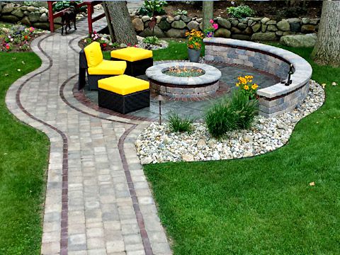 Patio fire pit and walkway designed and constructed by SereneScapes
