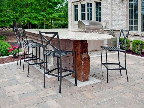 This photo features a patio with unique outdoor bar by SereneScapes.
